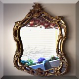 D17. Large mirror with scrolling and leaf motif. Some damage. 51”h x 35”w - $175 